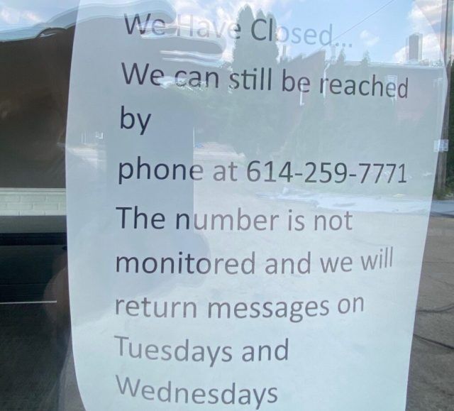 notice of closure on a closed used car lot.